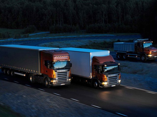 Three-orange-Scania-trucks-1-640x480.jpg