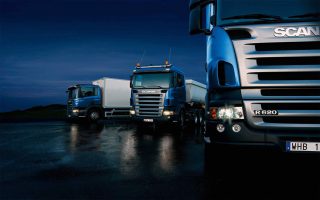 Three-trucks-on-blue-background-1-320x200.jpg